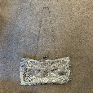 Gold snake print clutch